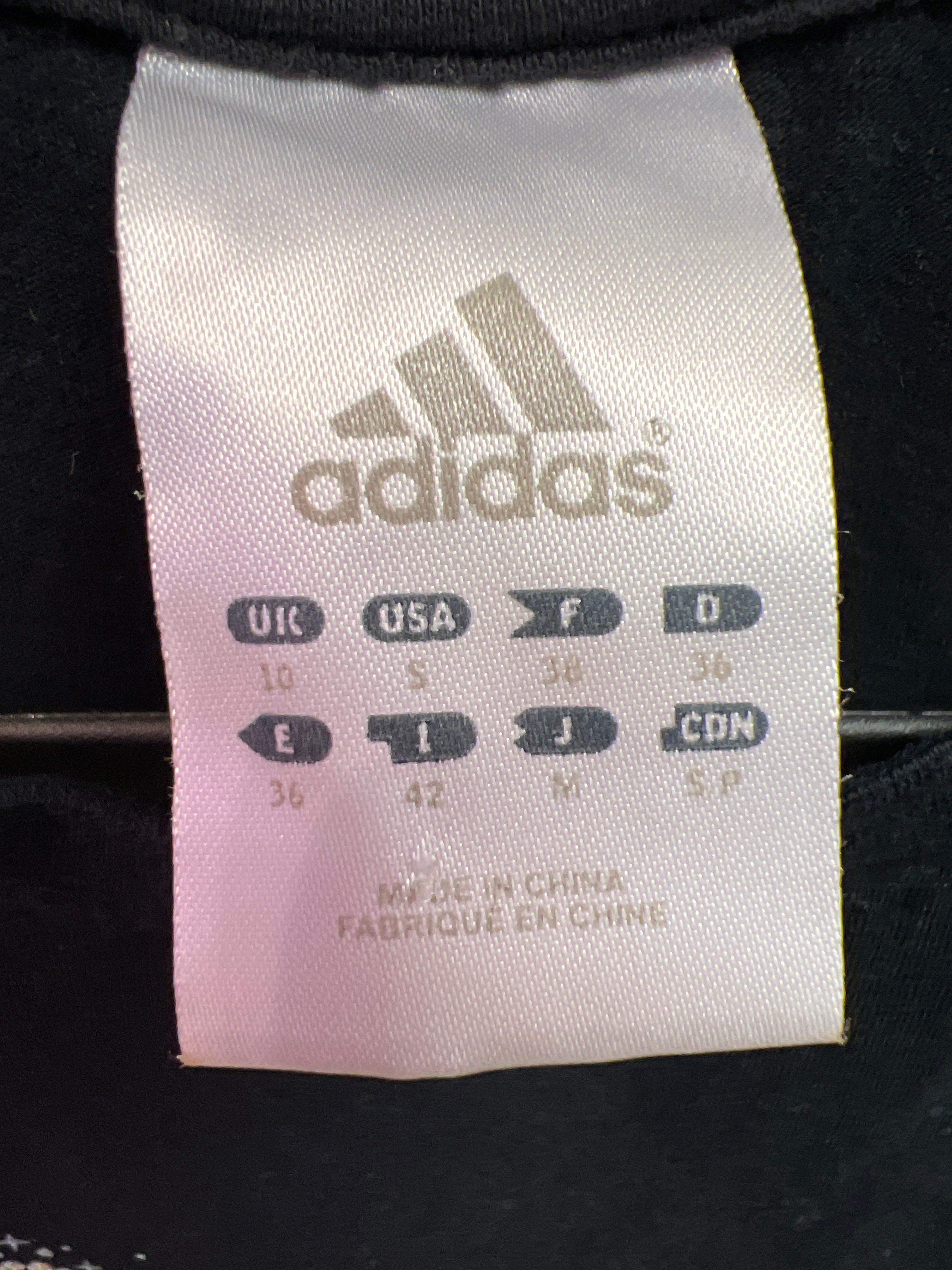 Adidas stones top