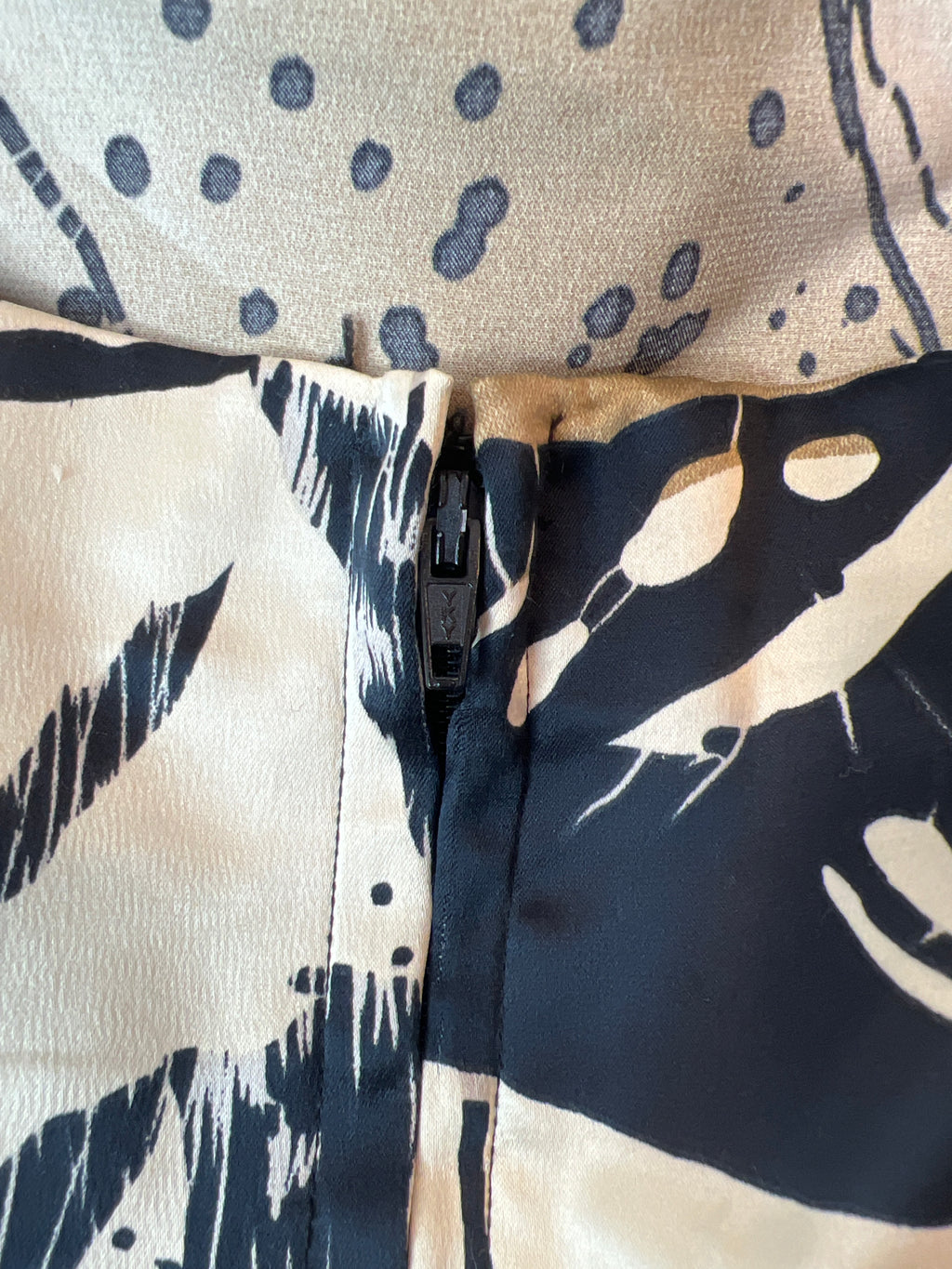 Beige and black patterned dress