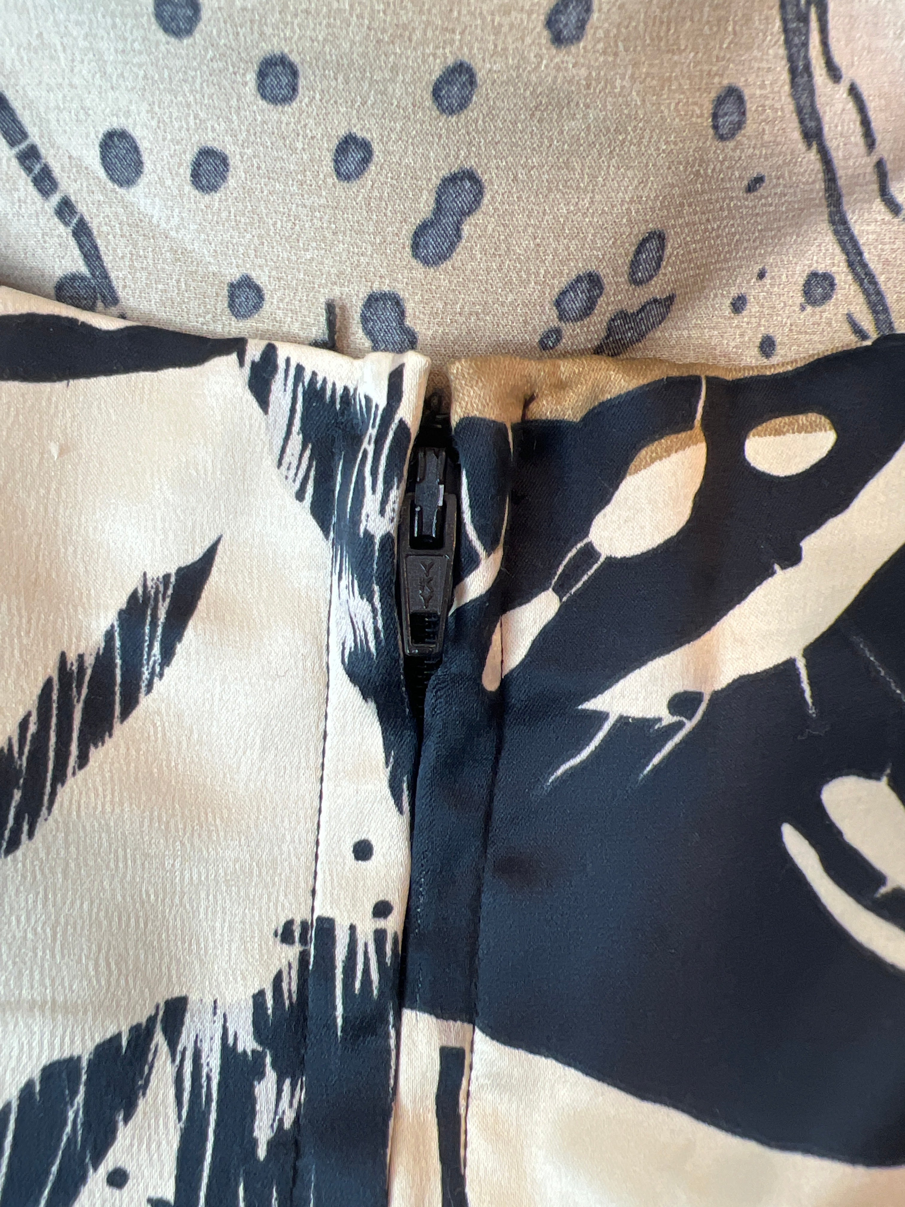 Beige and black patterned dress