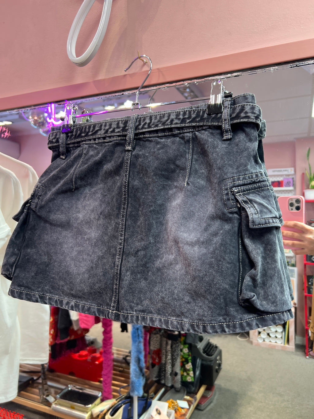 Black mini skirt with belt and side pockets