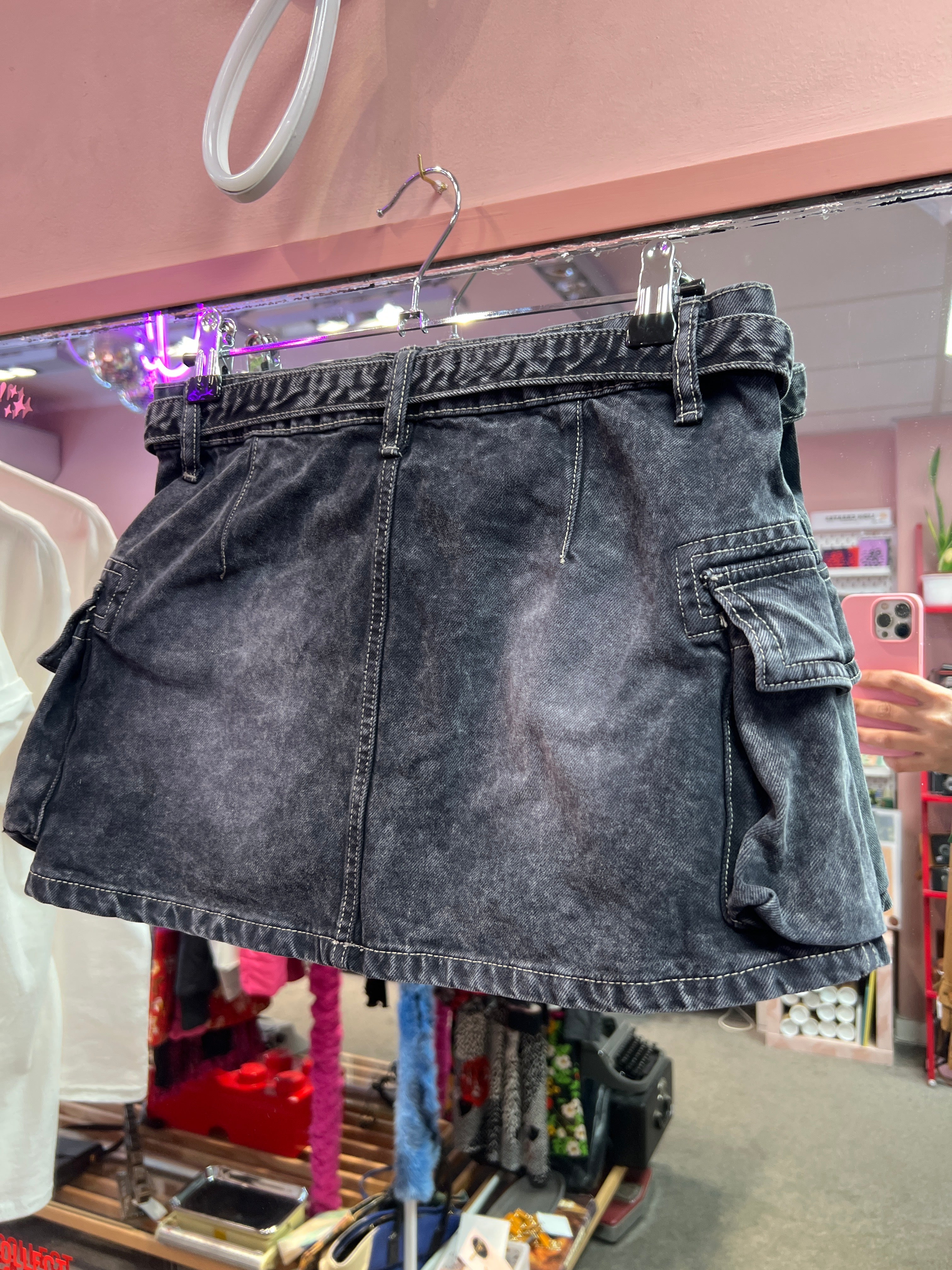 Black mini skirt with belt and side pockets
