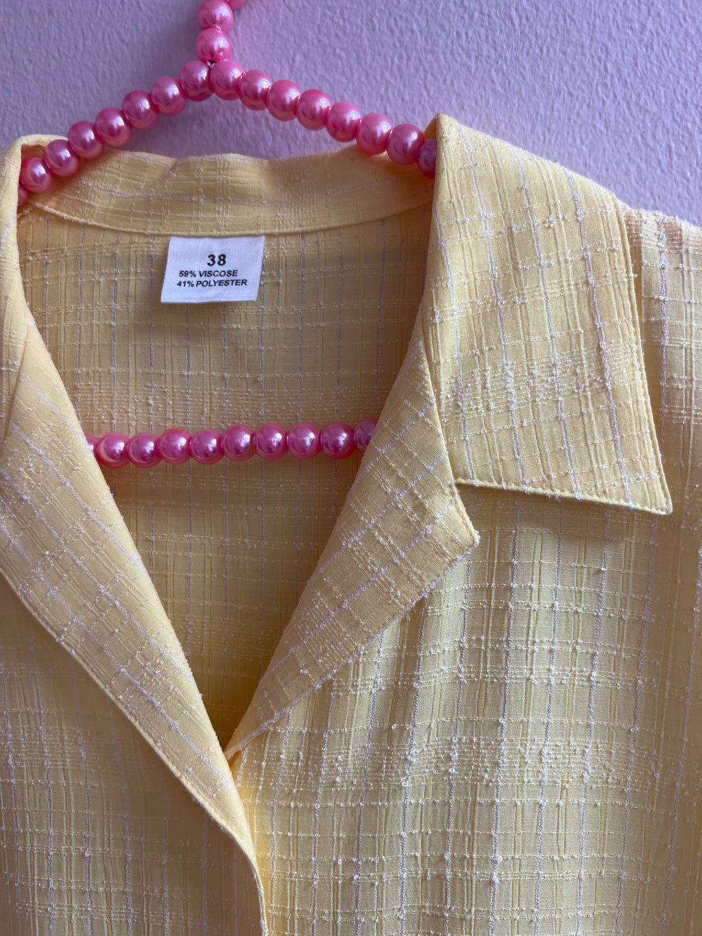 Yellow Sleeveless Button-up Top