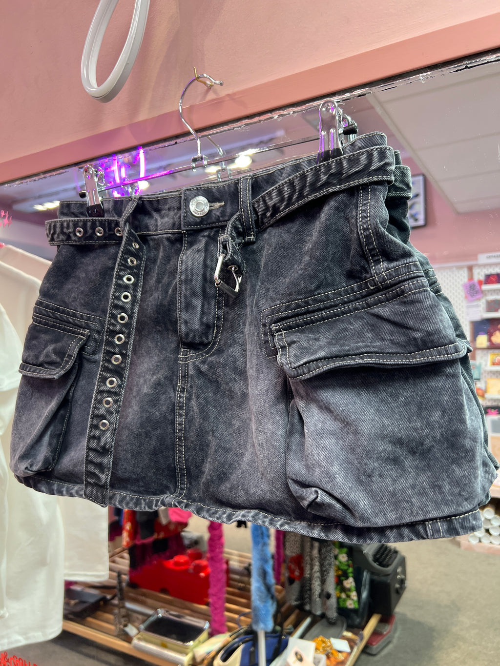 Black mini skirt with belt and side pockets