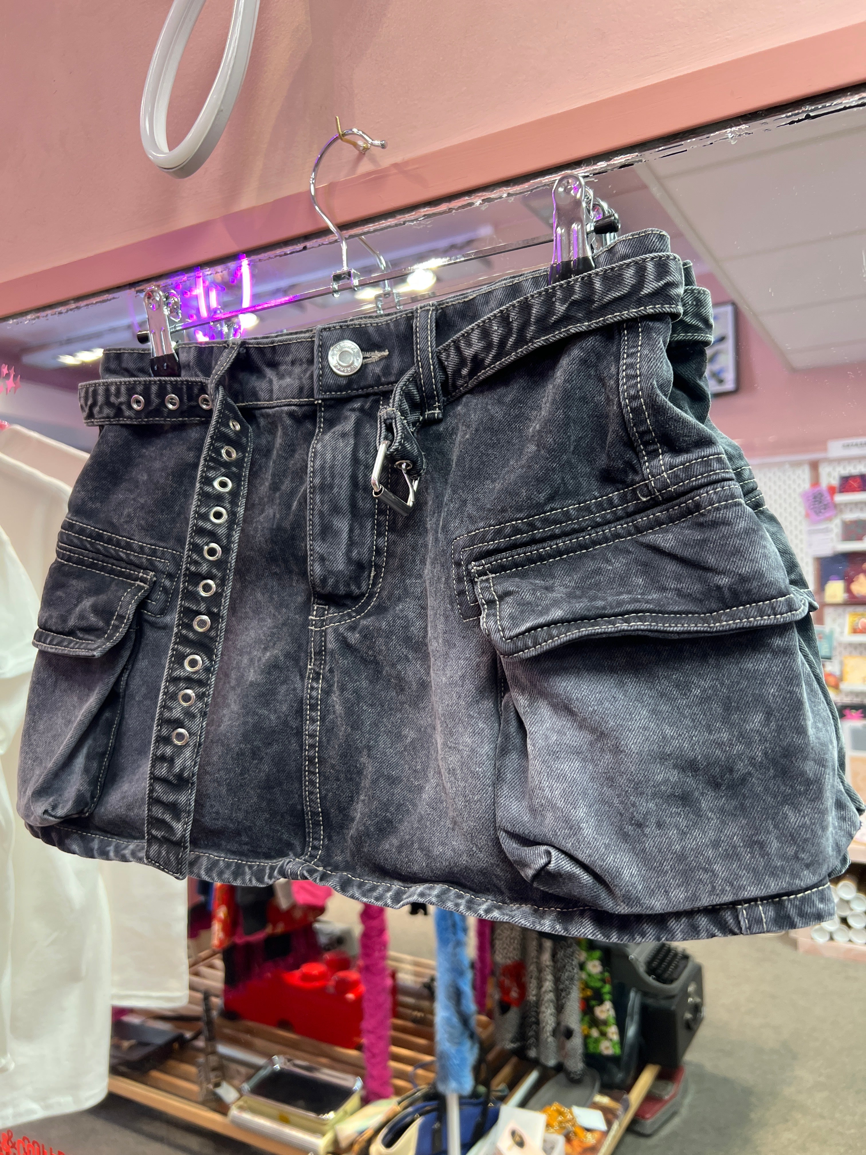 Black mini skirt with belt and side pockets