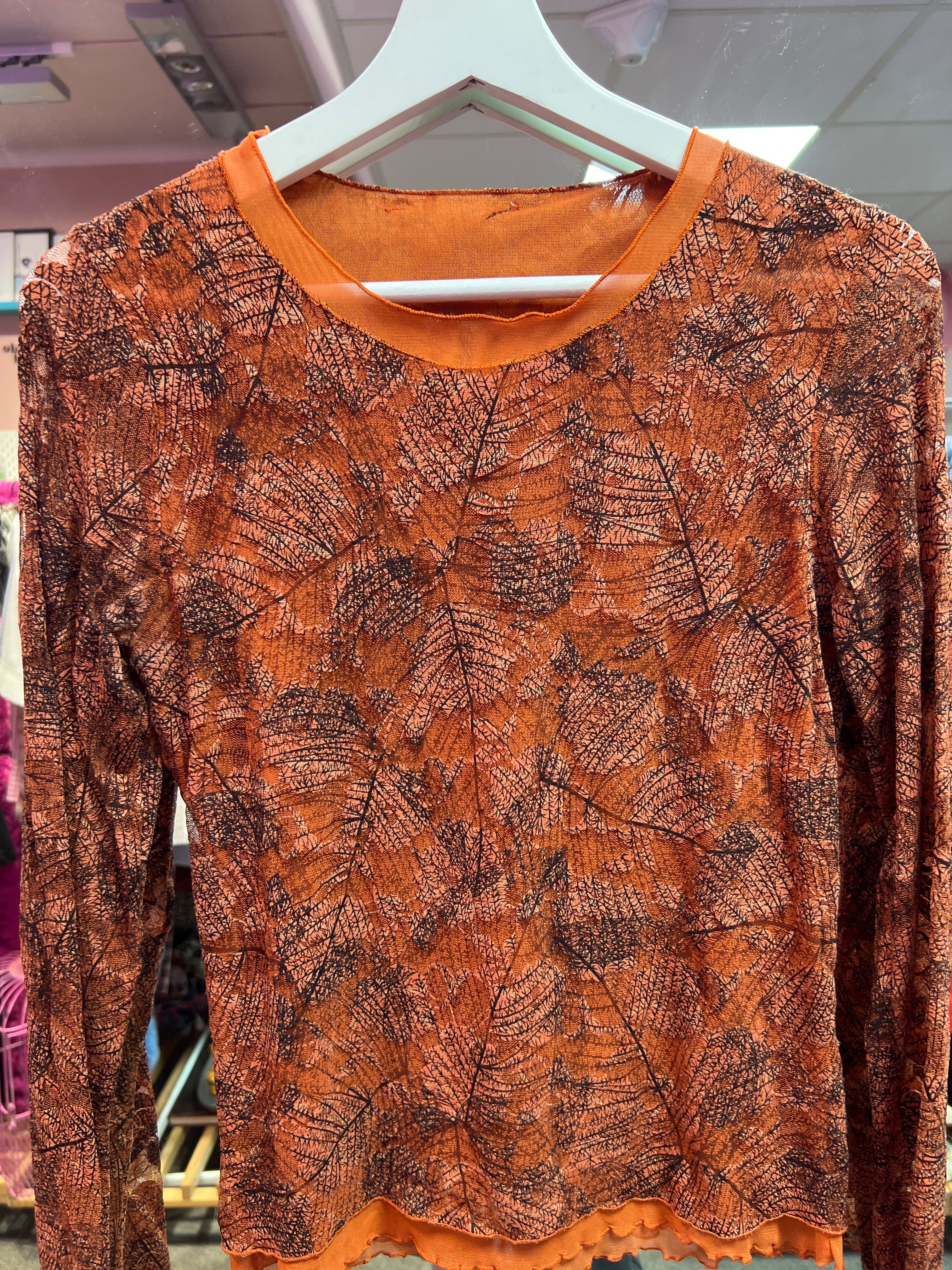 Y2K-inspirerad orange mönstrad topp