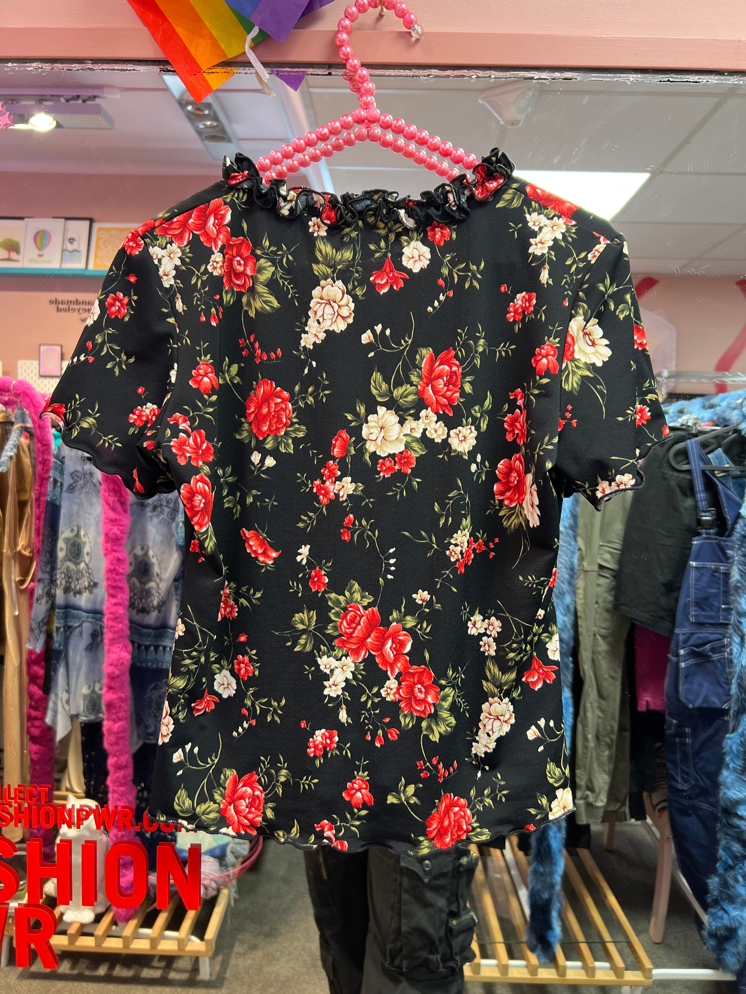 Black flower top with frills