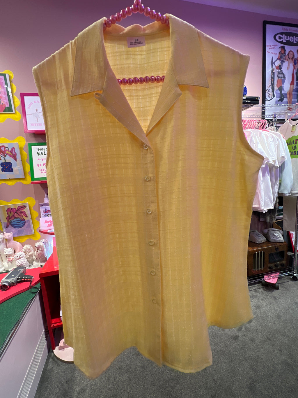 Yellow Sleeveless Button-up Top