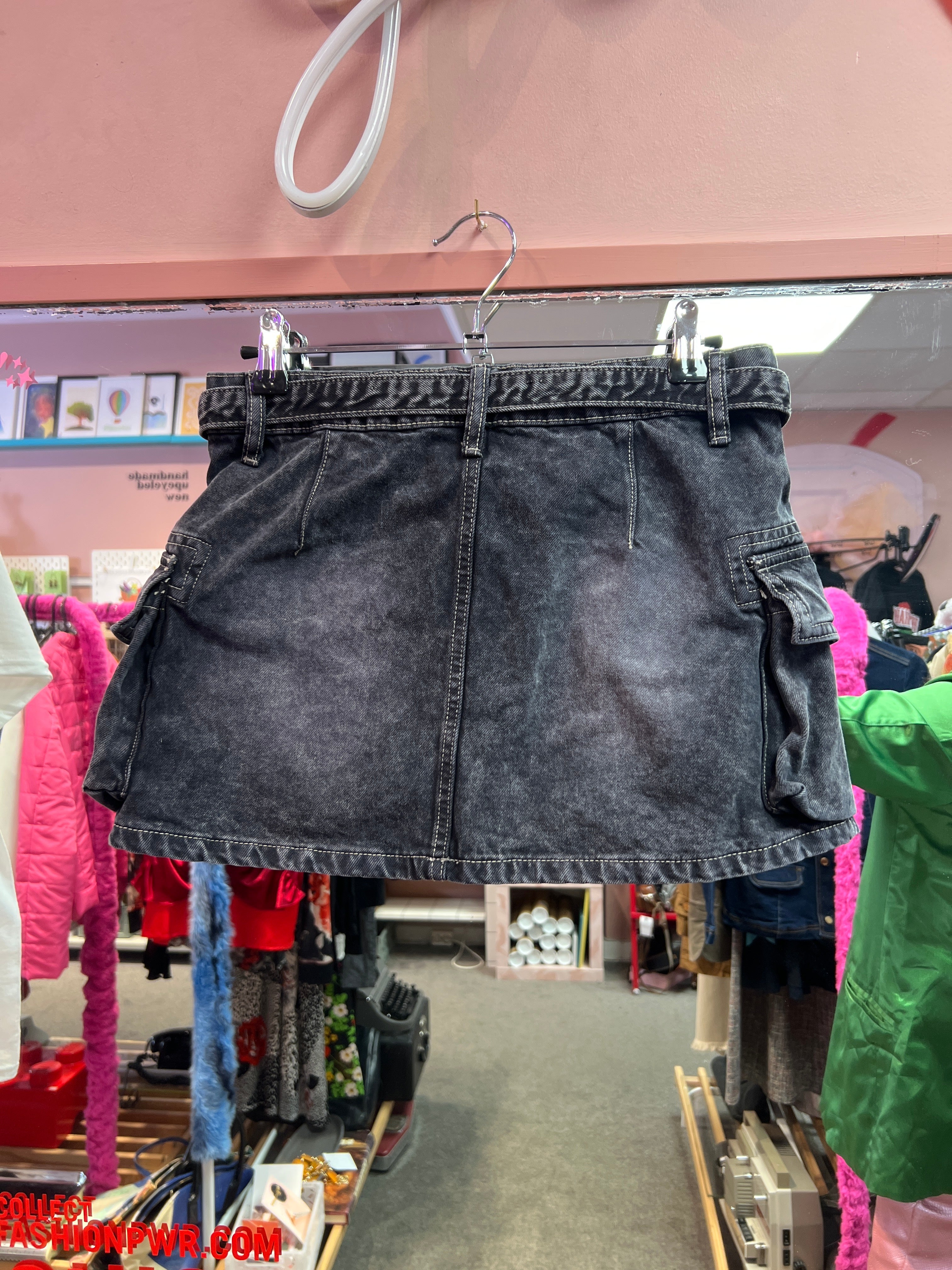 Black mini skirt with belt and side pockets